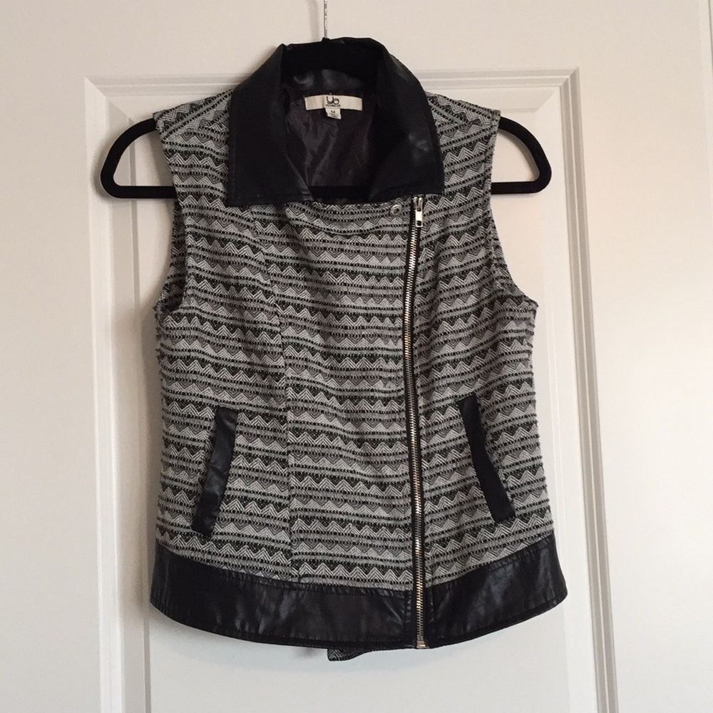 Black patterned vest.
